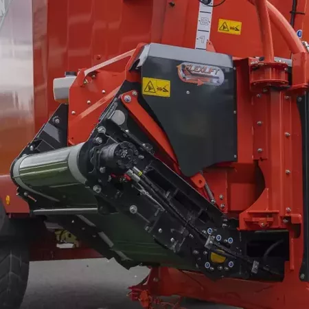 Le tapis FLEXILIFT assure la distribution haute en restant dans le gabarit de la machine