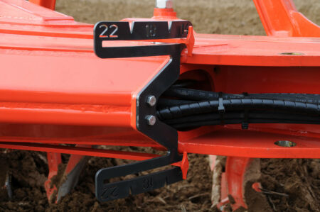 L'indicateur de la largeur de coupe visible depuis le poste de conduite