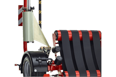 Le coupe-films réputé de type « ciseaux » maintient et coupe le film.